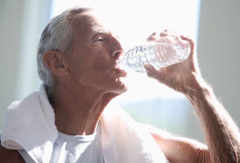 getty rr photo of senior man drinking water in gym