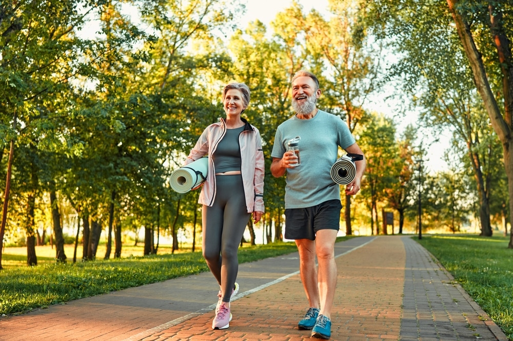 Older man and woman walking to support vein health in Los Angeles, CA